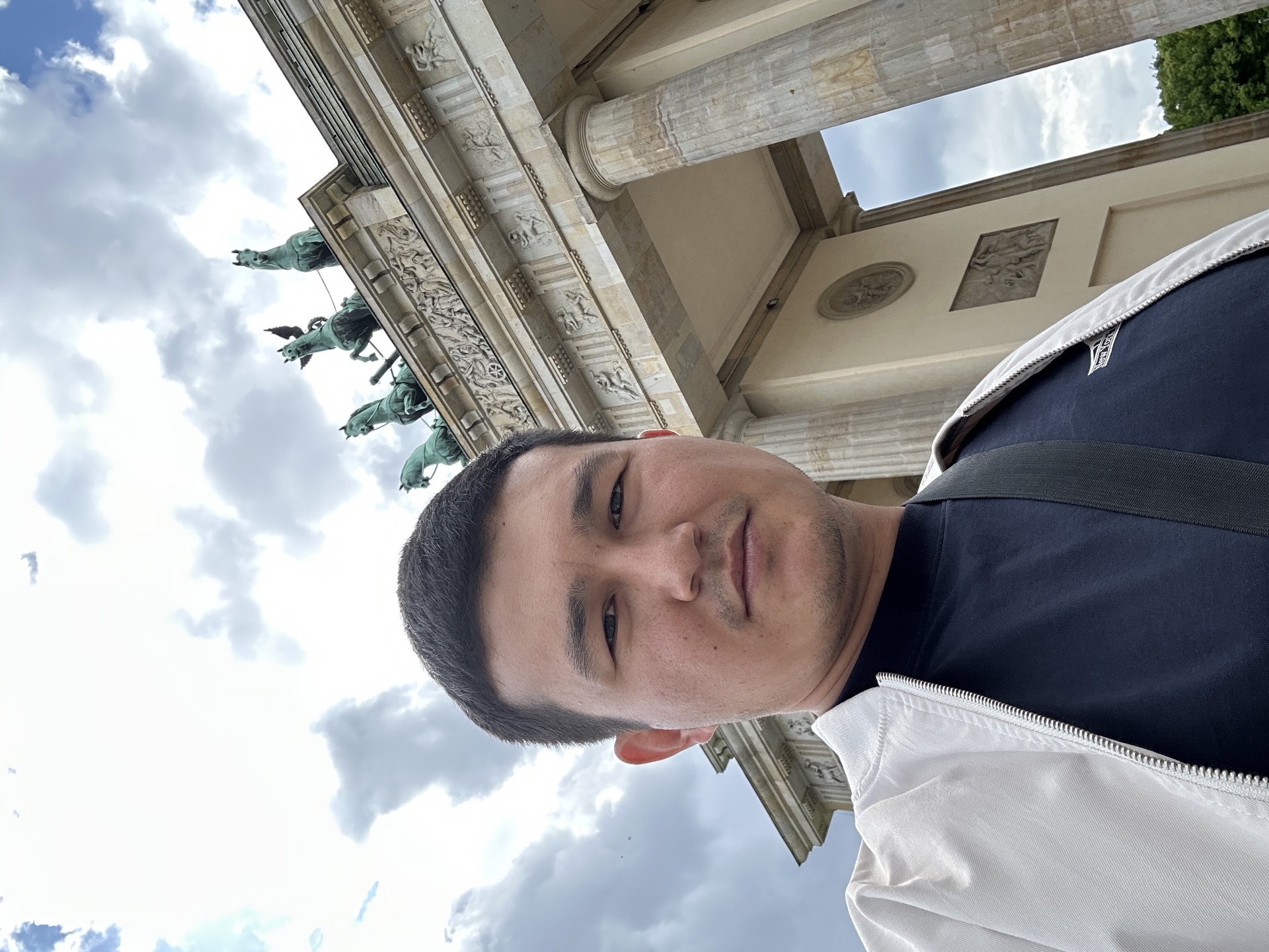Khurshid Normurodov at the Brandenburg Gate, Berlin